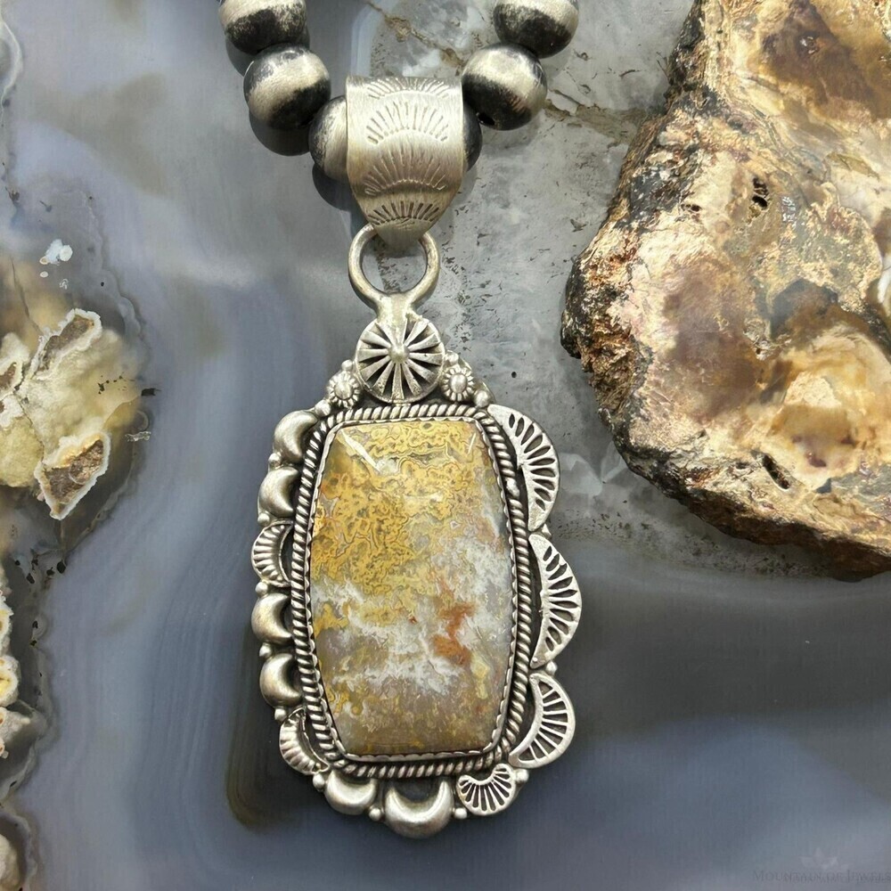 Sterling Southwestern Style Rectangle Petrified Plume Agate Decorated Pendant